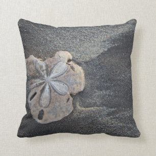 Sand dollar on sand throw pillow