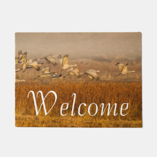 Sandhill Cranes over a golden field Doormat
