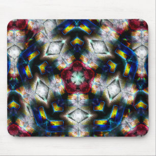 Sandy base with shapes in dark colours and lightin mouse pad