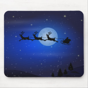 Santa and his reindeers flying at night mouse pad