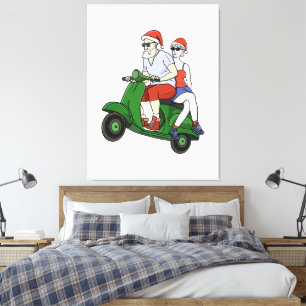 Santa and Mrs. Claus riding a scooter Canvas Print