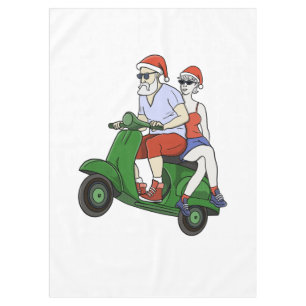Santa and Mrs. Claus riding a scooter Tablecloth