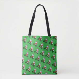 Santa and Mrs. Claus riding a scooter Tote Bag