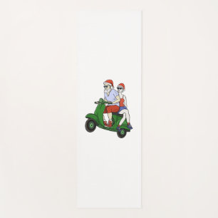 Santa and Mrs. Claus riding a scooter Yoga Mat
