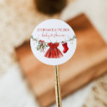 Santa Baby Girl Winter Christmas Baby Shower Classic Round Sticker<br><div class="desc">A festive round sticker featuring a watercolor Christmas baby clothesline. Perfect for sealing envelopes,  favour bags,  or party décor.</div>