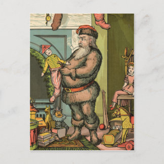 Santa Claus is putting a toy in a sock vintage Postcard