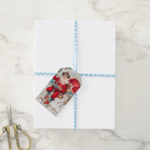 Santa Claus on a penny farthing with reindeer   Gi Gift Tags