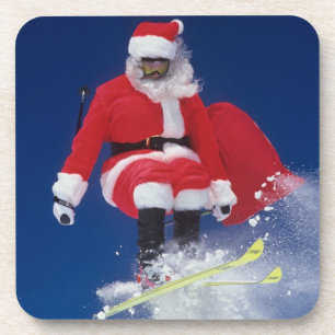 Santa Claus on skis jumping off a cornice at Coaster