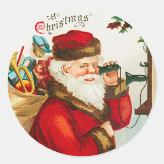 Santa Claus on string phones listening to Child Classic Round Sticker