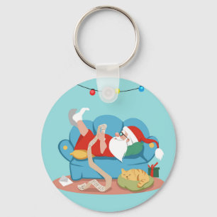 Santa Claus on the couch in pyjamas Keychain