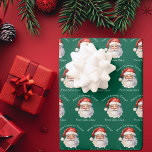 Santa Claus Personalized Green Kids Christmas Wrapping Paper Sheet<br><div class="desc">Customize these nostalgic from Santa Claus green wrapping paper sheets with your own personalized text with your kids name in white script. This beautiful old fashioned drawing of Santa's red hat and white beard is the perfect holiday gift wrap for your children's presents under the tree on Christmas day.</div>