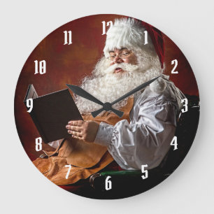 Santa Claus reads book Large Clock
