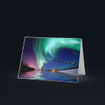 Santa Claus & the Northern Lights Holiday Card<br><div class="desc">Santa Claus at the North Pole,  waving while flying off with his reindeer into the beautiful Northern Lights. The Aurora Borealis is reflecting into the lake water with the bright colourful colours.</div>