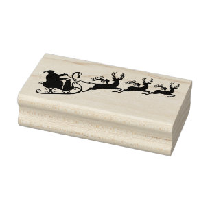Santa Claus with his sleigh and reindeer Rubber Stamp