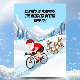 Santa Cycling with Reindeer Postcard