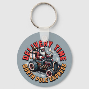 Santa delivering gifts in a classic hot rod. keychain