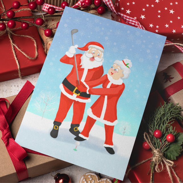 Santa Helping Mrs. Claus With Her Golf Swing Postcard (A fun Christmas postcard for the golfing couple!)
