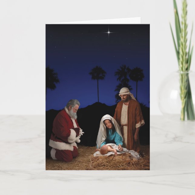 Santa Kneeling at Nativity Holiday Card (Front)