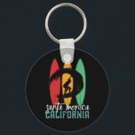 Santa Monica Beach California Retro Surfing Keychain<br><div class="desc">Vintage retro surfboard design for surfers who love surfing and riding the ocean waves. Cool summer holiday, spring break merchandise for those who enjoy hot sun, tropical weather, sunbathing under the palm tree. Grunge and distressed design to wear while enjoying the beach party and singing around the bonfire. Great souvenir,...</div>