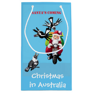 Santa postman delivering presents small gift bag