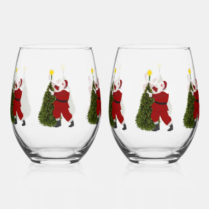 Santa Putting the Star on the Tree Wine Glass Set