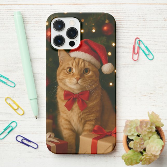 Santa Ribbon Cat iPhone 12 Pro Max Case (On Desk)