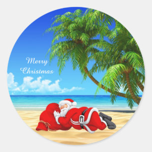 santa sleeping on the beach classic round sticker