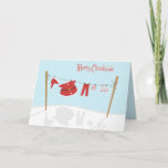 Santa Suit on Clothesline Christmas Card<br><div class="desc">Fun design featuring Santa's suit and unmentionables hanging on a clothesline on a snowy winter day. Inside text is customizable.</div>