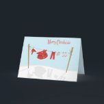 Santa Suit on Clothesline Christmas Card<br><div class="desc">Fun design featuring Santa's suit and unmentionables hanging on a clothesline on a snowy winter day. Inside text is customizable.</div>