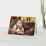 Santa's Blenheim Cavalier Holiday Card<br><div class="desc">Santa at home with his Blenheim Cavalier King Charles Spaniel,  relaxing in front of a cozy fire before the big night.  (Notice Mona Lisa over the mantel.)</div>