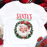 Santa's Coming to Town Classic Christmas Tri-Blend Shirt<br><div class="desc">Get ready for the most wonderful time of the year with this classic "Santa's Coming to Town" tee! Featuring a jolly Santa Claus surrounded by a festive wreath, this shirt is perfect for spreading holiday cheer. The traditional design and warm colours evoke the nostalgia and excitement of Christmas, making it...</div>