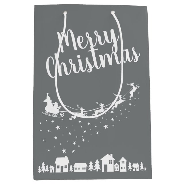Santa's sleigh & reindeers flying above the houses medium gift bag (Front)
