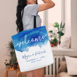 Sapphire Tide Personalized Wedding Welcome Tote Bag<br><div class="desc">Custom allover printed wedding welcome tote bags. The design features an abstract blue watercolor background and "Welcome" text in hand-lettered style script to coordinate with our Sapphire Tide collection. Personalize it with the bride and groom's names, wedding date and location or other custom text. Use the design tools to change...</div>