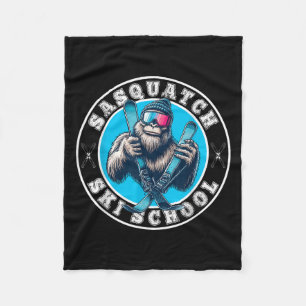 Sasquatch Ski School Funny Bigfoot Skiing Fleece Blanket