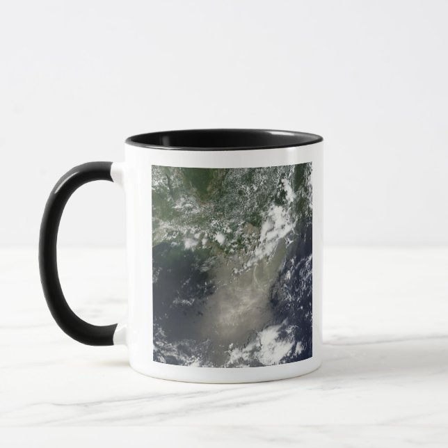 Satellite view of streaks and ribbons of oil mug (Left)