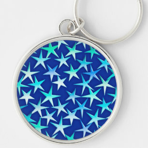 Satin stars, pale blue on cobalt keychain