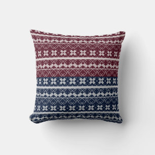 Scandinavian ornament on a blue, burgundy throw pillow