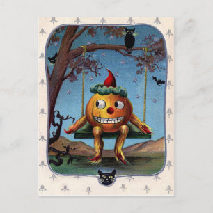 Scared pumpkin on a swing at Halloween night Postcard