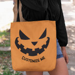 Scary Jack O Lantern Custom Orange Halloween Party Tote Bag<br><div class="desc">This spooky orange Halloween tote bag for trick or treating features a cool smiling Jack O Lantern and your own personalized text. Cute and scary custom party bags to use for trick or treat or party favours.</div>