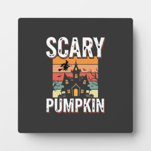 Scary Pumpkin Haunted House Halloween Design_1 Plaque