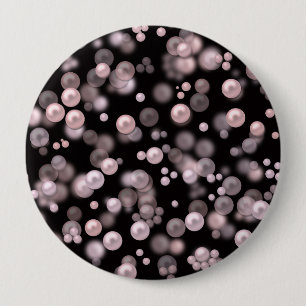 Scatterings of pink and white pearls on black velv 4 inch round button