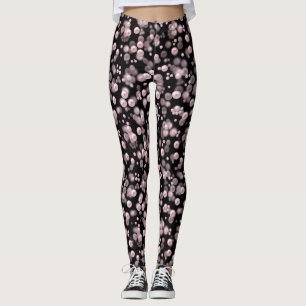 Scatterings of pink and white pearls on black velv leggings