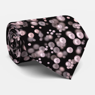 Scatterings of pink and white pearls on black velv tie