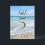 Scenic Hearts in the Sand Beach Table Number<br><div class="desc">5x7 Table Number Card for a Beach Wedding. Scenic hearts in the sand beach image, for visions of relaxation in paradise, celebrate your beach wedding with this lovely design. Two interlocking hearts drawn in the beach sand on the ocean shore, perfect for a destination, island, tropical paradise coastal nautical event....</div>