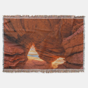 Scenic of eroded sandstone cave throw blanket