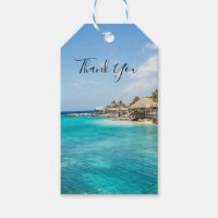 Scenic Tropical Beach with Thatched Huts Photo