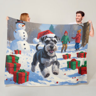 Schnauzer Running in Snow with Christmas Hat Fleece Blanket