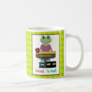 School is cool! Frog at her desk Back to school Coffee Mug