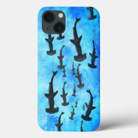School of Hammerhead Sharks in Silhouette