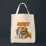 Scooby-Doo and the Gang Investigate Book Tote Bag<br><div class="desc">Check out Velma reading a clue in a book, surrounded by Daphne, Fred, Shaggy, and Scooby-Doo!</div>